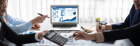 Business intelligence and data analysis concept. Analyst team working on financial data analysis...