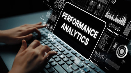 Hands-on Keyboard with Digital Dashboard Displaying Performance Analytics Metrics and Data...