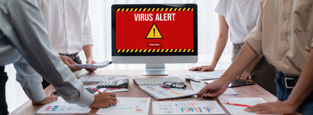 Virus warning alert on computer screen detected brisk cyber threat , hacker, computer virus and...