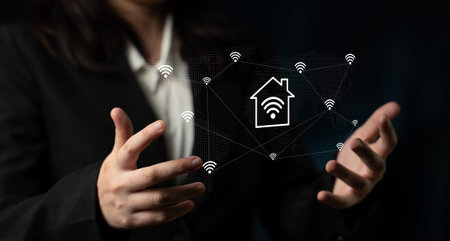 A business professional presents smart home technology concepts, showcasing wireless network symbols...
