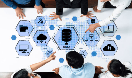 Business professionals engage in data analysis, utilizing modern technology to discuss insights and...