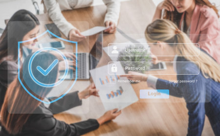 A business team focuses on a secure login process illustrated with a digital shield, showcasing the...