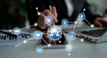 A businessperson interacts with technology in a modern workspace, showcasing communication networks...