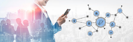 A business professional interacts with a smartphone, illustrating digital network connections...