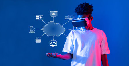 A young man explores cloud computing and online development with a VR headset in a vibrant,...