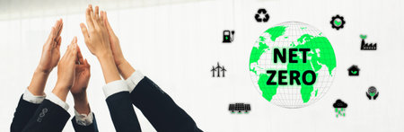 Professionals hands raised in celebration of reaching a Net Zero goal, symbolizing collaboration and...