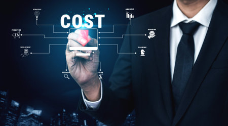 Businessman Holding Red Arrow Signifying Cost Reduction with Business Data Analysis Graphics in...