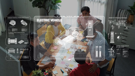 A diverse group of professionals collaborates in a modern workspace to discuss electric vehicle...