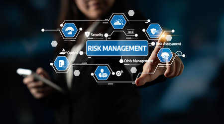 A business professional interacts with a touchscreen displaying digital risk management icons in a...
