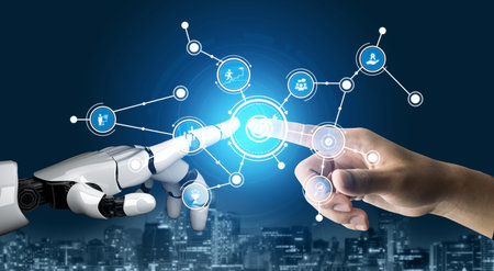 A human hand and a robotic hand connect in a vibrant digital environment, symbolizing the...