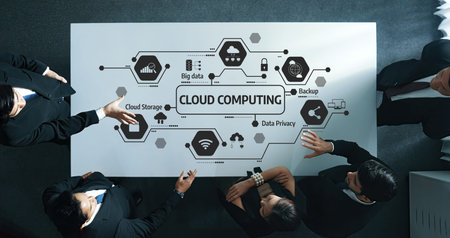 A group of professionals collaborates on cloud computing strategies, focusing on data privacy,...