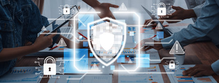A diverse business team works together in a modern office setting, focusing on data security...