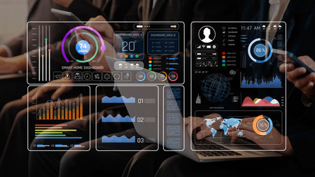 Explore an engaging scene of digital dashboards showcasing real-time data analytics, smart home features, and innovative technology in action within a modern workspace. Rasterの写真素材