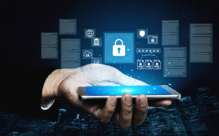 A hand holds a smartphone displaying digital security icons in a futuristic cyber environment,...