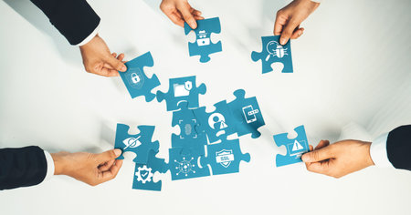 A group of professionals collaboratively arranging puzzle pieces, representing various aspects of...