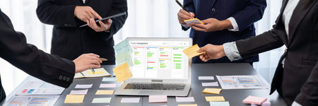 Analyst team uses sticky notes for creative and analytic brainstorming for business ideas with a BI...