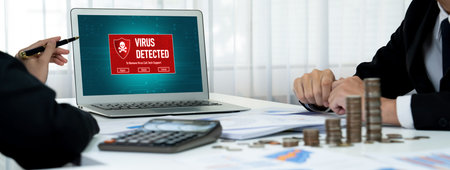 Virus warning alert on computer screen detected brisk cyber threat , hacker, computer virus and...