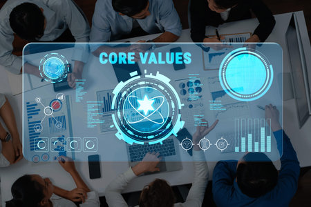 A diverse business team collaborates in a modern office environment, utilizing innovative technology to discuss core values and analyze digital data for strategic planning. Trope