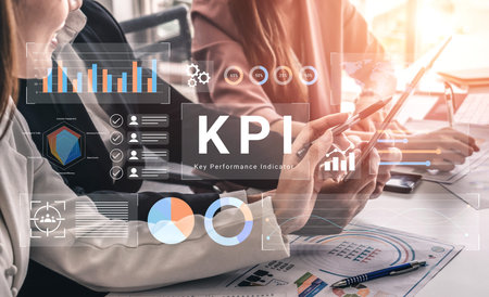 A modern business meeting scene showcasing professionals discussing key performance indicators with digital charts and graphs on the table, highlighting important data analysis. Gantry