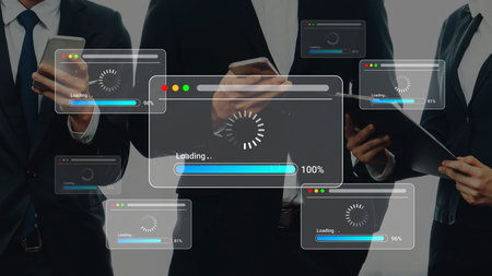 Business professionals using technology with loading screens on smartphones and tablets in a modern office setting, representing digital connectivity and progress.