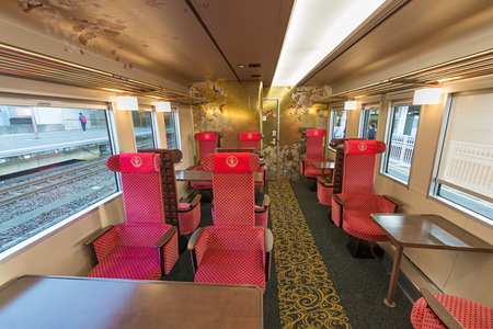 ISHIKAWA,JAPAN-APRIL 8,2016:Interior of the "Hanayome Noren" train. The 2nd car adopt designs often used in local lacquer-ware. Doors and ceiling detailing like gold leaf and cherry blossom pattern.のeditorial素材