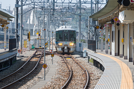 TOYAMA,JAPAN-APRIL 9,2016: Local train at Toyama station. This train use 521 Series train, operated...