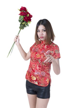 Happy Chinese new year. beautiful young Asian woman with flowersの写真素材