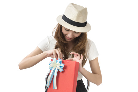 Beautiful woman with a gift boxesの写真素材