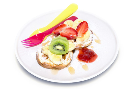 Top Sprinkle fruit on bread with strawberry jam on white backgroundの写真素材