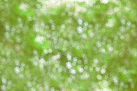 abstract background with bokeh defocused lights and shadowの写真素材