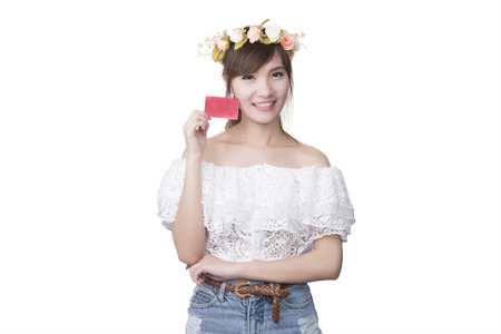 portrait of young smiling women holding credit cardの写真素材