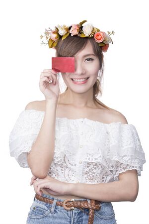 portrait of young smiling women holding credit cardの写真素材
