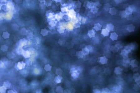 abstract background with bokeh defocused lights and shadowの写真素材