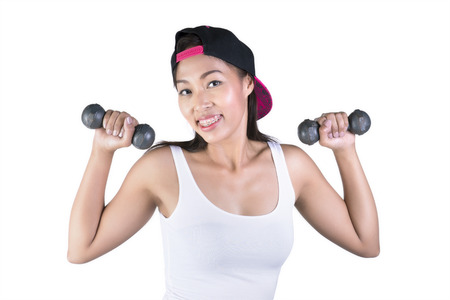 Fitness female posing against white backgroundの写真素材