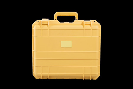 yellow case on black の写真素材