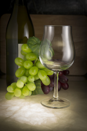 Still life: White wine in glass on a marble table elegant.の写真素材