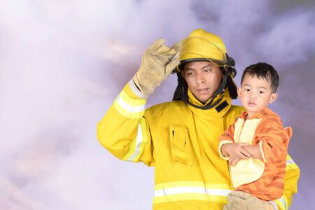 Firefighters helping people and animals from the fire.の写真素材
