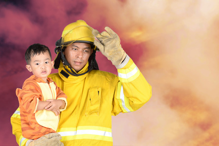 Firefighters helping people and animals from the fire.の写真素材