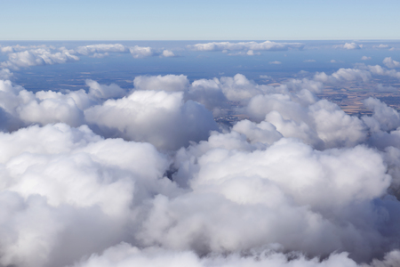 Blue sky background with a cloudsの写真素材