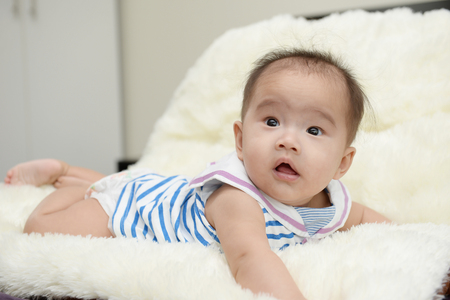 Baby and Mom : Moments of happiness between mother and child.の写真素材