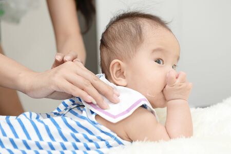 Baby and Mom : Moments of happiness between mother and child.の写真素材