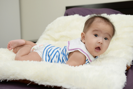 Baby and Mom : Moments of happiness between mother and child.の写真素材