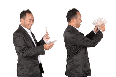 Businessmen are happy from the stock market.の写真素材