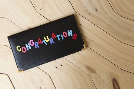 Wooden letters written word "congratulations".の写真素材