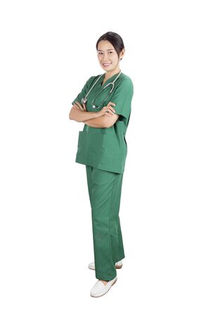 Beautiful female doctor with a smile committed on white background.の写真素材