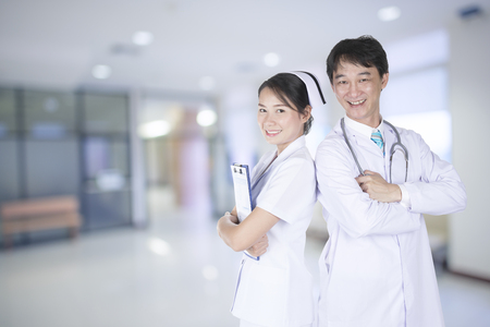 Doctor and nurse with a commitment in the hospital.の写真素材