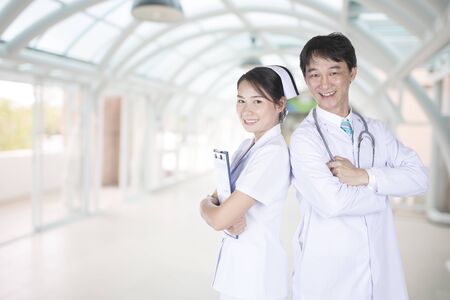 Doctor and nurse with a commitment in the hospital.の写真素材