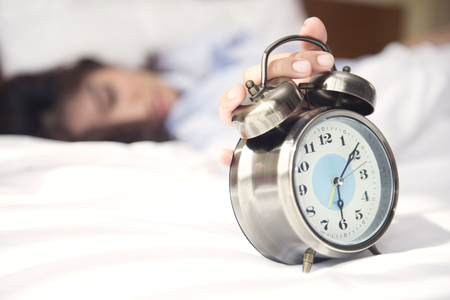 Wake up, it's time to start preparing for a new day. Soft focus at clockの写真素材