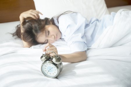 Wake up, it's time to start preparing for a new day. Soft focus at clockの写真素材