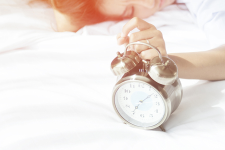 Wake up, it's time to start preparing for the morning light. Soft focus at clockの写真素材